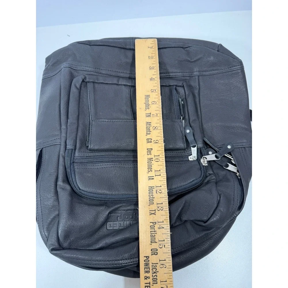New United Motor Manufacturing Black Leather Backpack Multi Pocket YKK Zipper